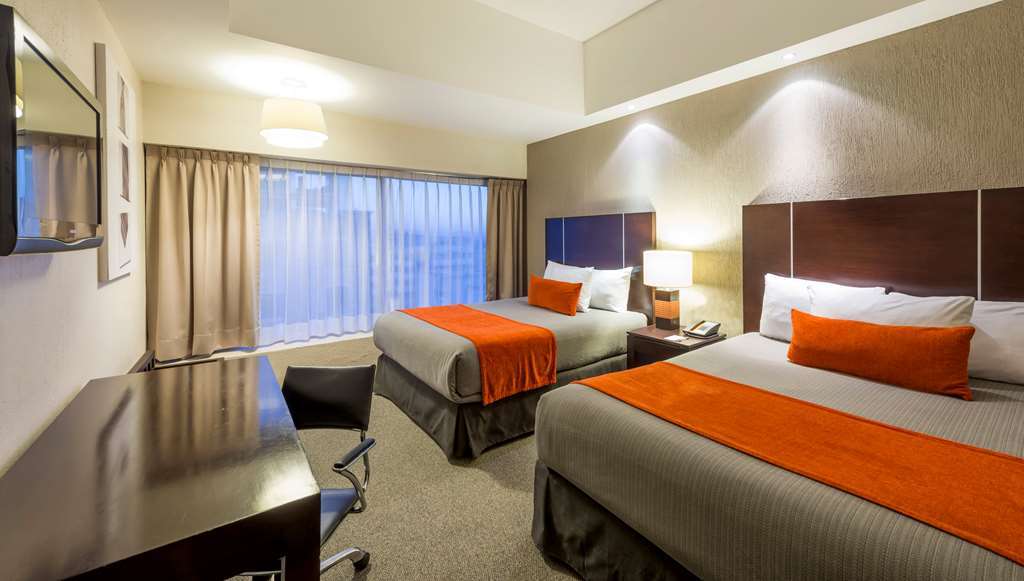 Hotel Plaza Genova Centro グアダラハラ 部屋 写真